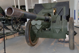 105 H 37-10 (  105- Bofors 10,5  haubits m/40    122-  . 1910/30 .),  , .